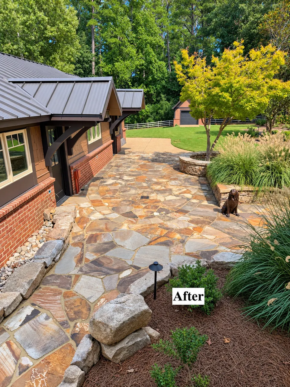 Completed natural stone walkway with retaining stone, landscaping and integrated site work.